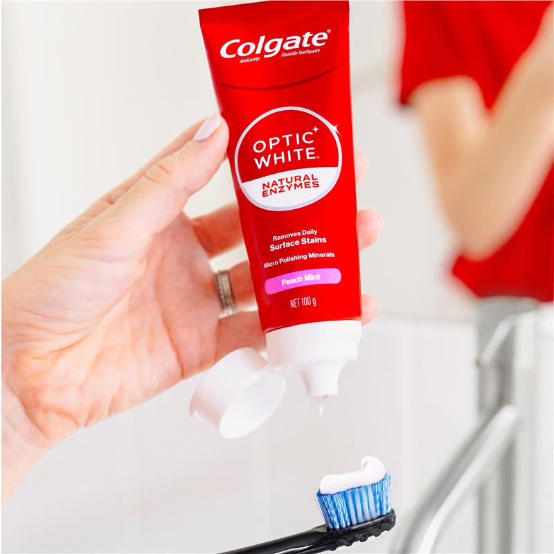 Load image into Gallery viewer, Colgate Toothpaste Optic White Natural Enzymes Peach Mint 100g

