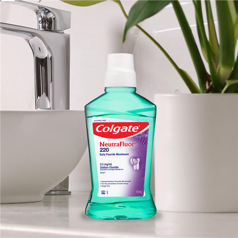 Load image into Gallery viewer, Colgate NeutraFluor 220 Daily Fluoride Mouthwash Mint 473mL
