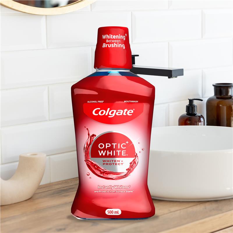 Load image into Gallery viewer, Colgate Optic White Teeth Whitening Mouthwash with Optic Brightener, Alcohol Free 500mL
