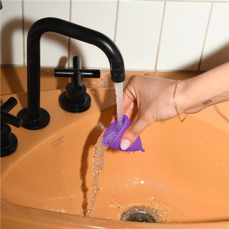 Load image into Gallery viewer, Moxie Menstrual Cup with Purse-worthy Pod Regular
