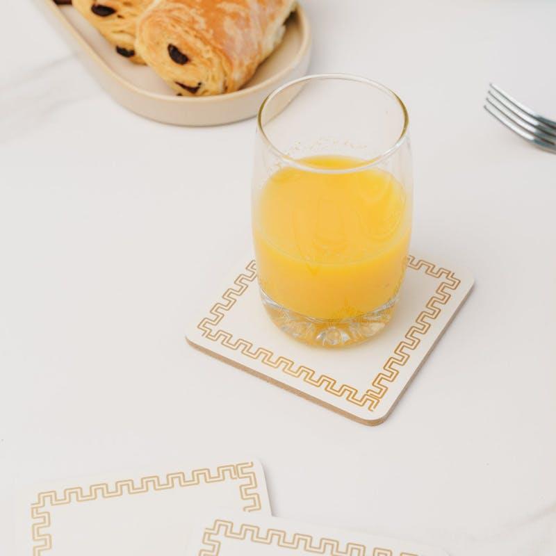 Load image into Gallery viewer, Clevinger MDF Placemats and Coasters Gold Border 8 Pieces
