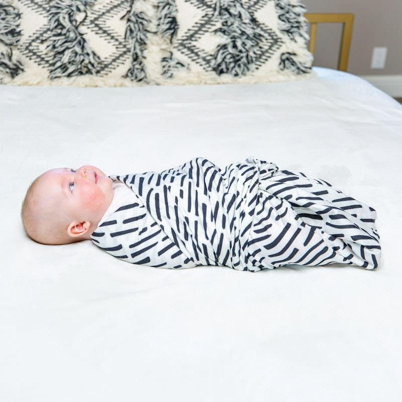 Load image into Gallery viewer, Tiny Twinkle Kaffle® Swaddle Blanket Ink Strokes
