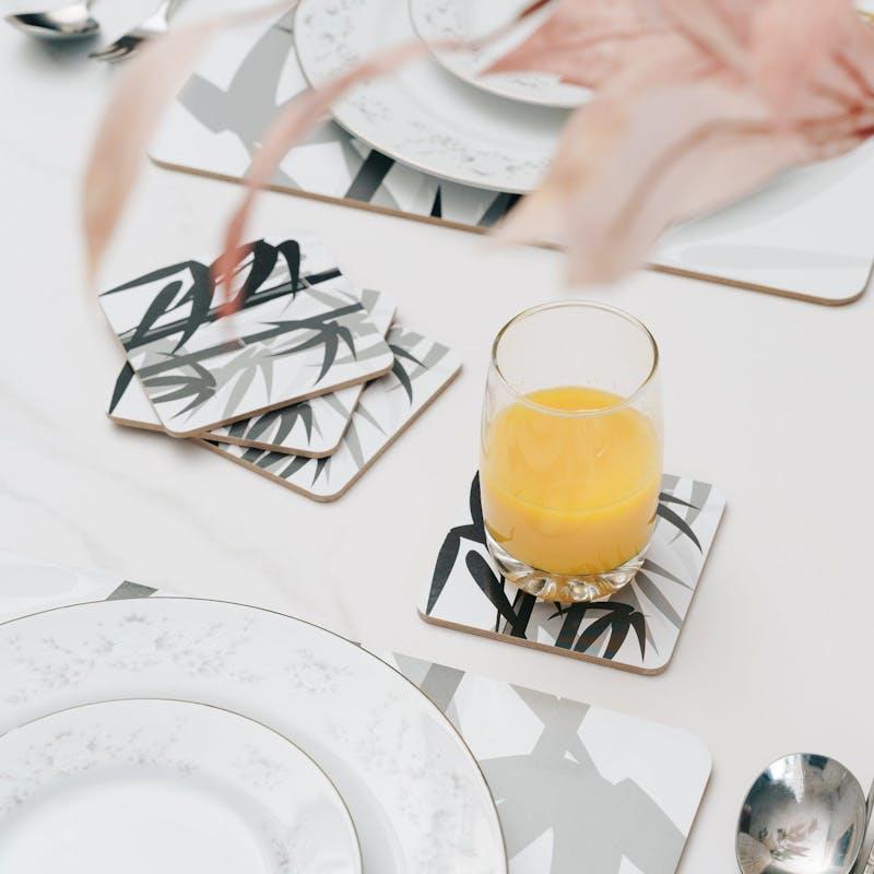 Load image into Gallery viewer, Clevinger MDF Placemats and Coasters Bamboo 8 Pieces
