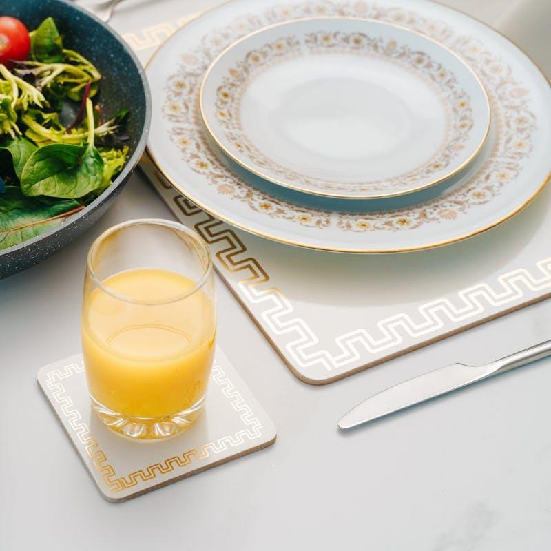 Load image into Gallery viewer, Clevinger MDF Placemats and Coasters Gold Border 8 Pieces

