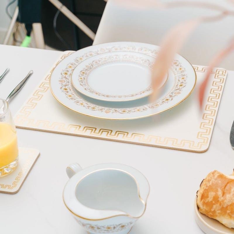 Load image into Gallery viewer, Clevinger MDF Placemats and Coasters Gold Border 8 Pieces
